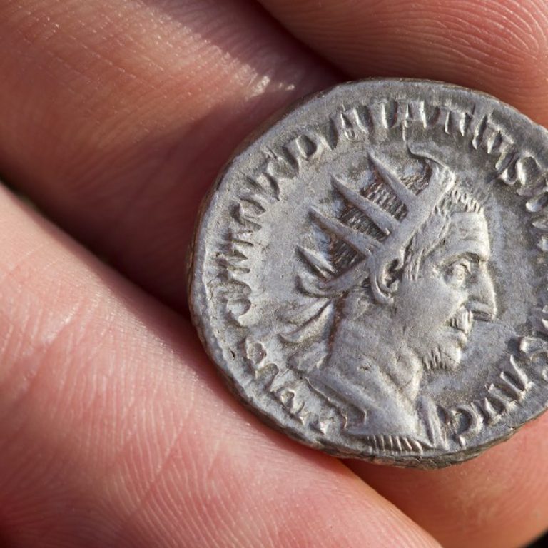 Roman silver coin with portrait of caesar
