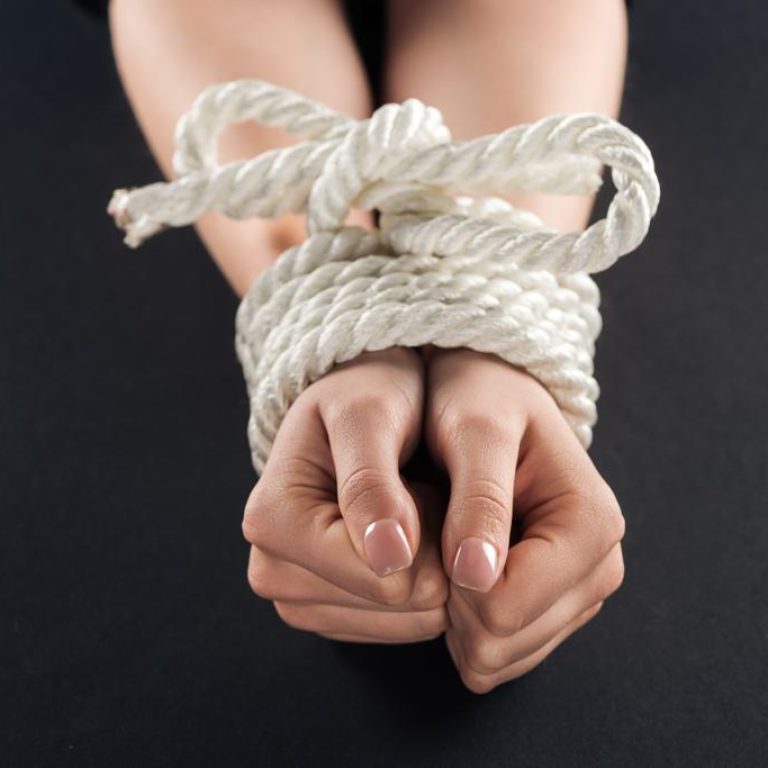 stock-photo-cropped-view-female-bound-hands